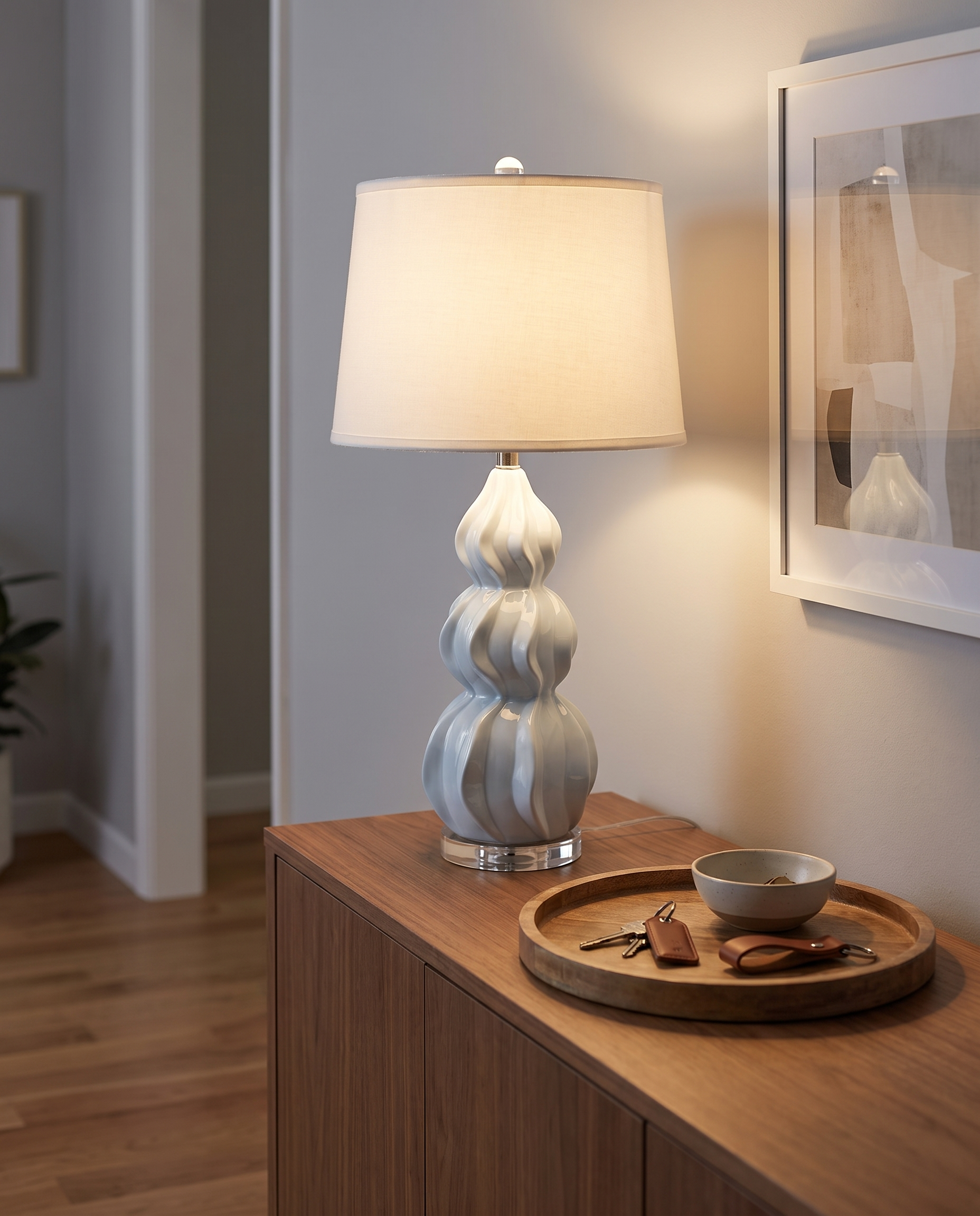 Juno gray-blue ceramic gourd table lamp in an entryway