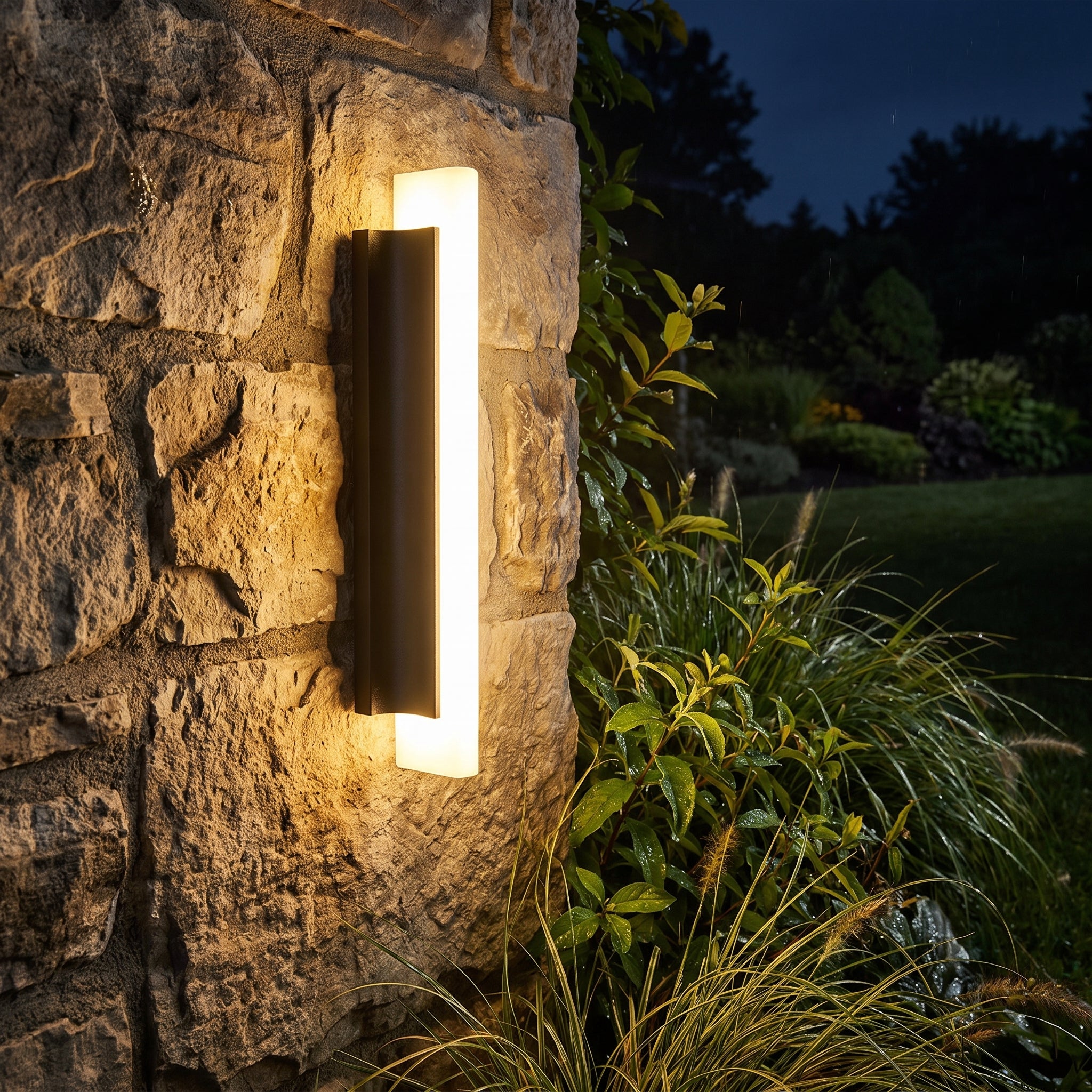 Petra outdoor wall light on a garden wall