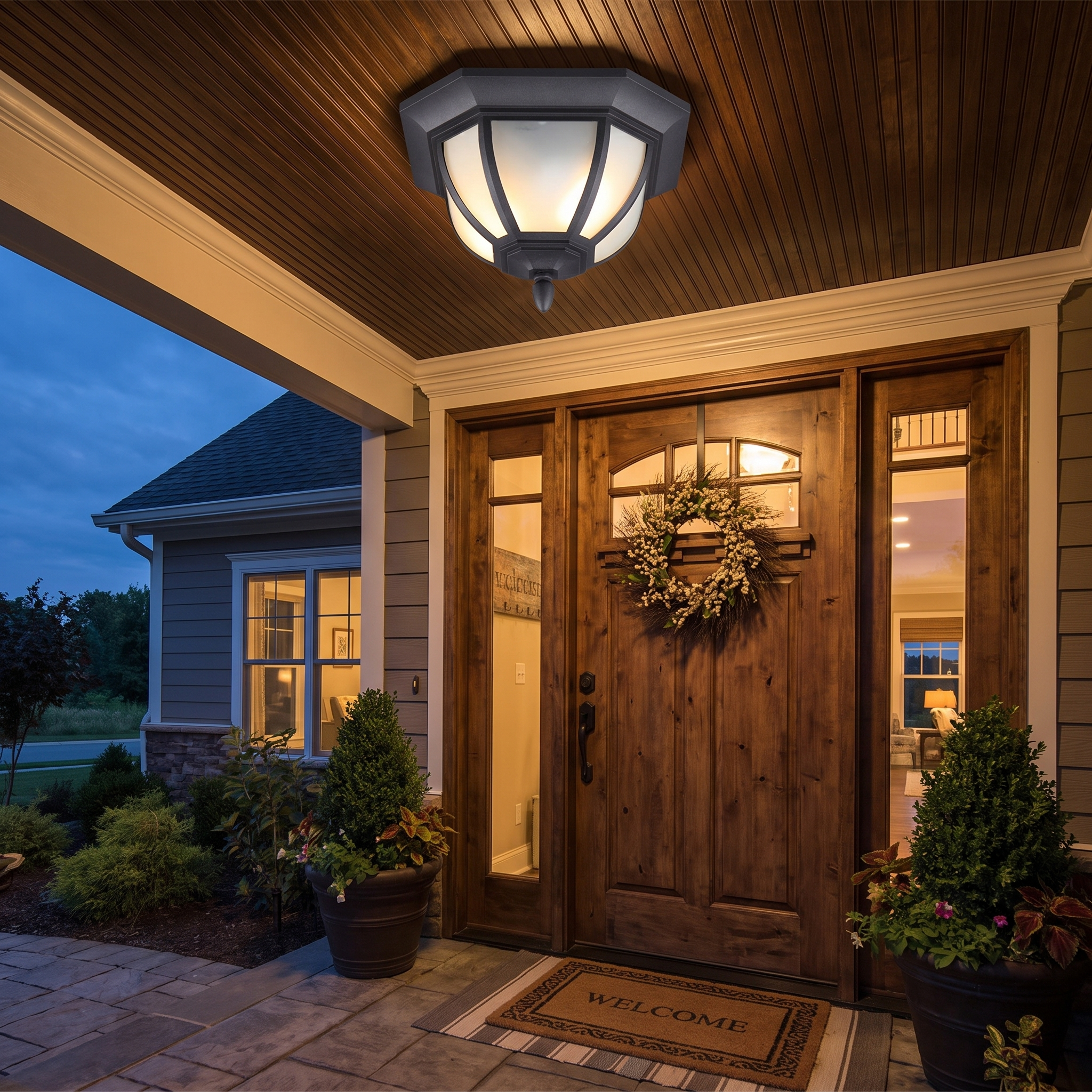 Amalie flush mount on covered porch ceiling at twilight
