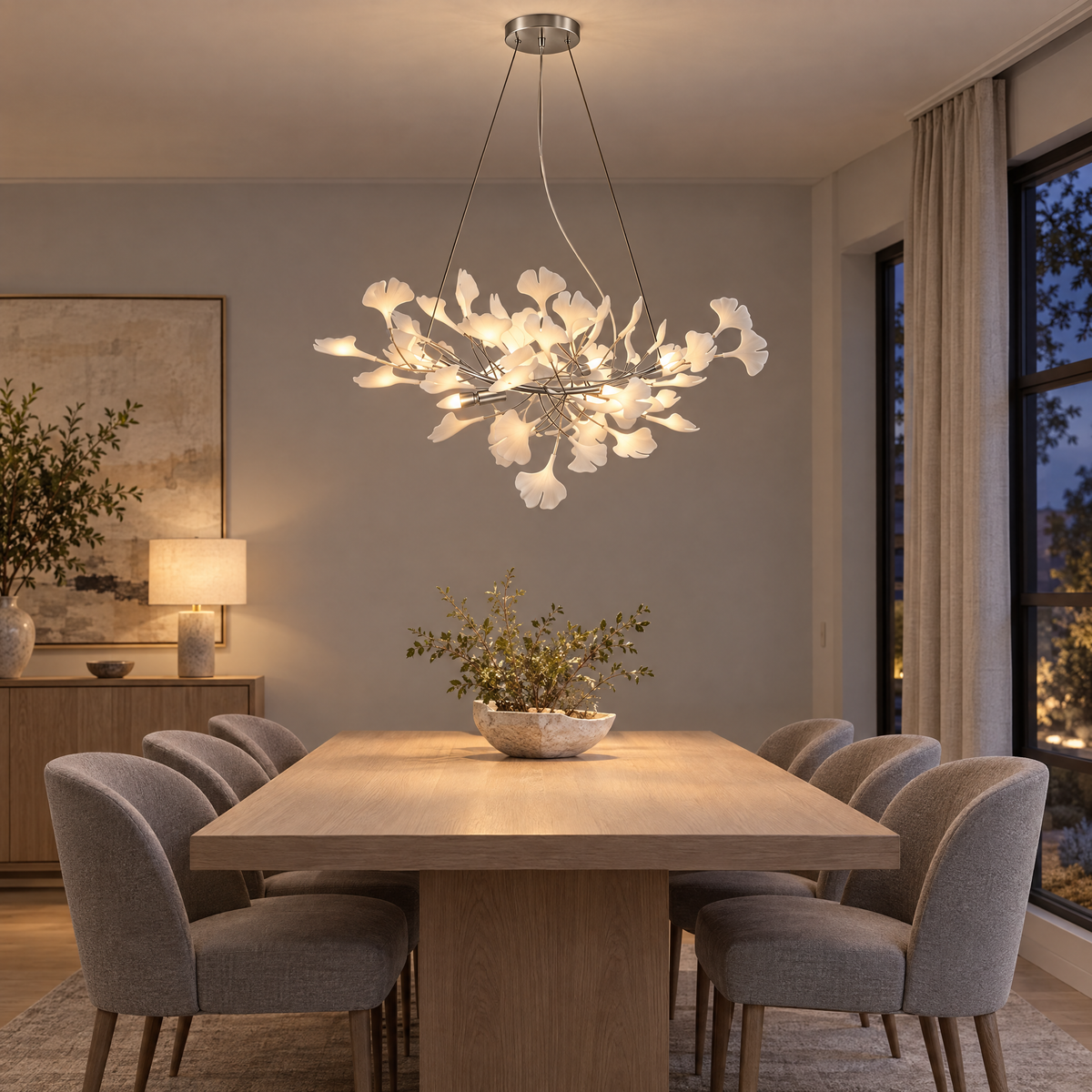 Horizon Ceramic Ginkgo Leaf Chandelier in Nickel above a white oak dining table