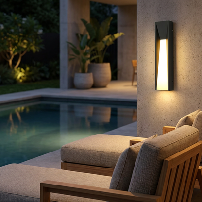 Aurelle wall light on contemporary backyard patio at night