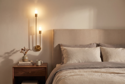 Gemini Dual Head LED Wall Sconce in a minimalist bedroom