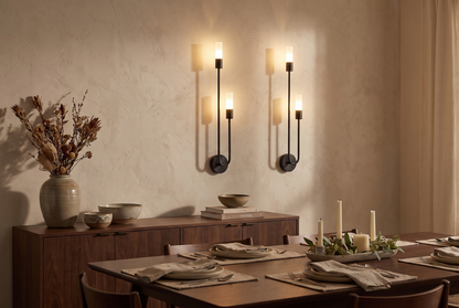Black Gemini Dual Head LED Wall Sconce in an elegant dining room