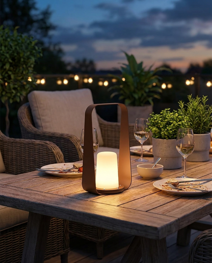 Marin brown waterproof outdoor lamp on a patio table