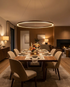 Halo coffee LED ring chandelier above a dining table