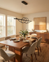 Calyx black Nordic chandelier over a dining table