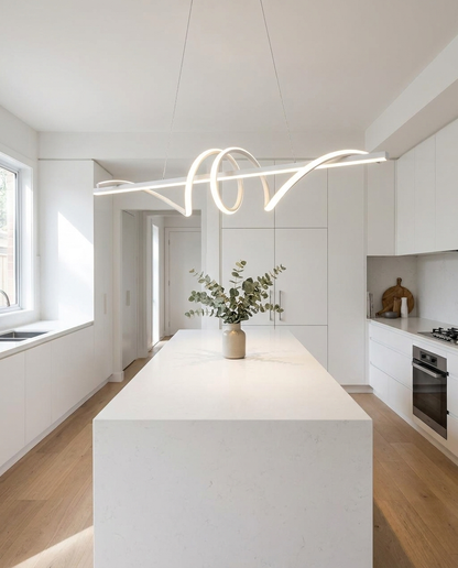 Calyx white Nordic chandelier over a minimalist kitchen island