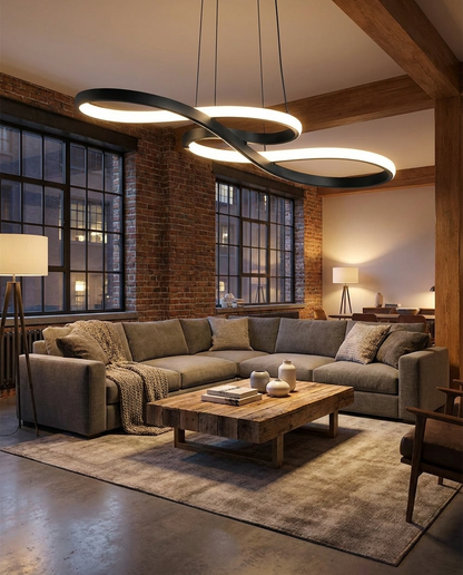 Lirelle black ribbon pendant over a living room lounge