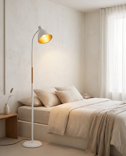 White Alder wood arc floor lamp in a minimalist bedroom