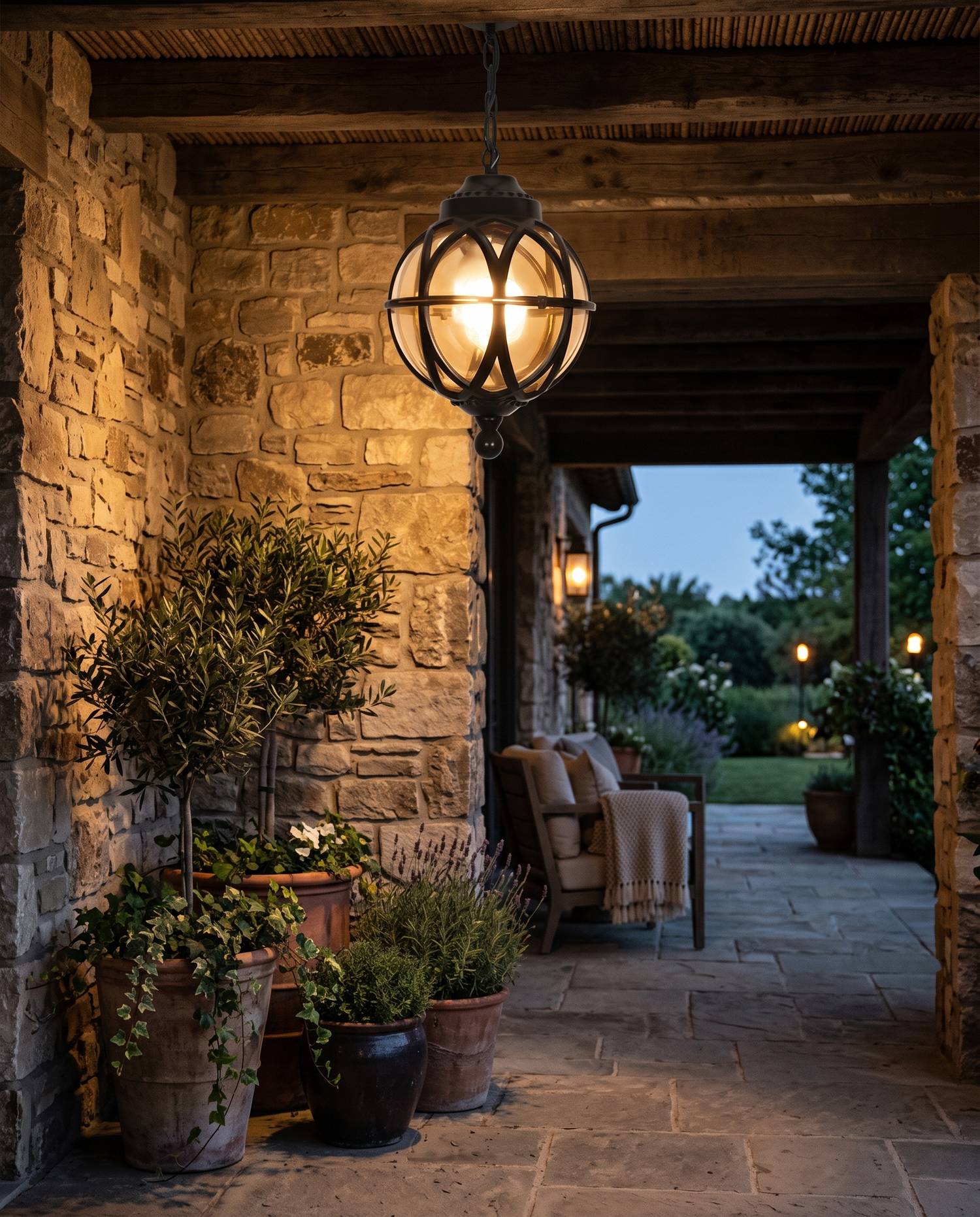 Black orb pendant light at a patio entryway