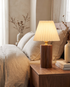 Seol Table Lamp in Walnut on a bedroom nightstand