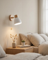 Sorbet Wall Sconce in White in a bedroom
