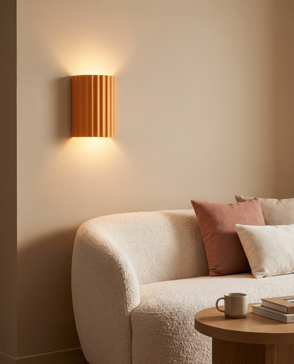 Momo Wall Sconce in Orange in a living room