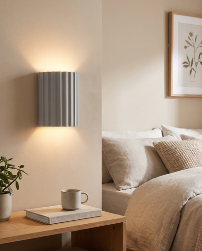 Momo Wall Sconce in Gray in a bedroom
