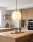 Bianca Orb Pendant Light over a dining table