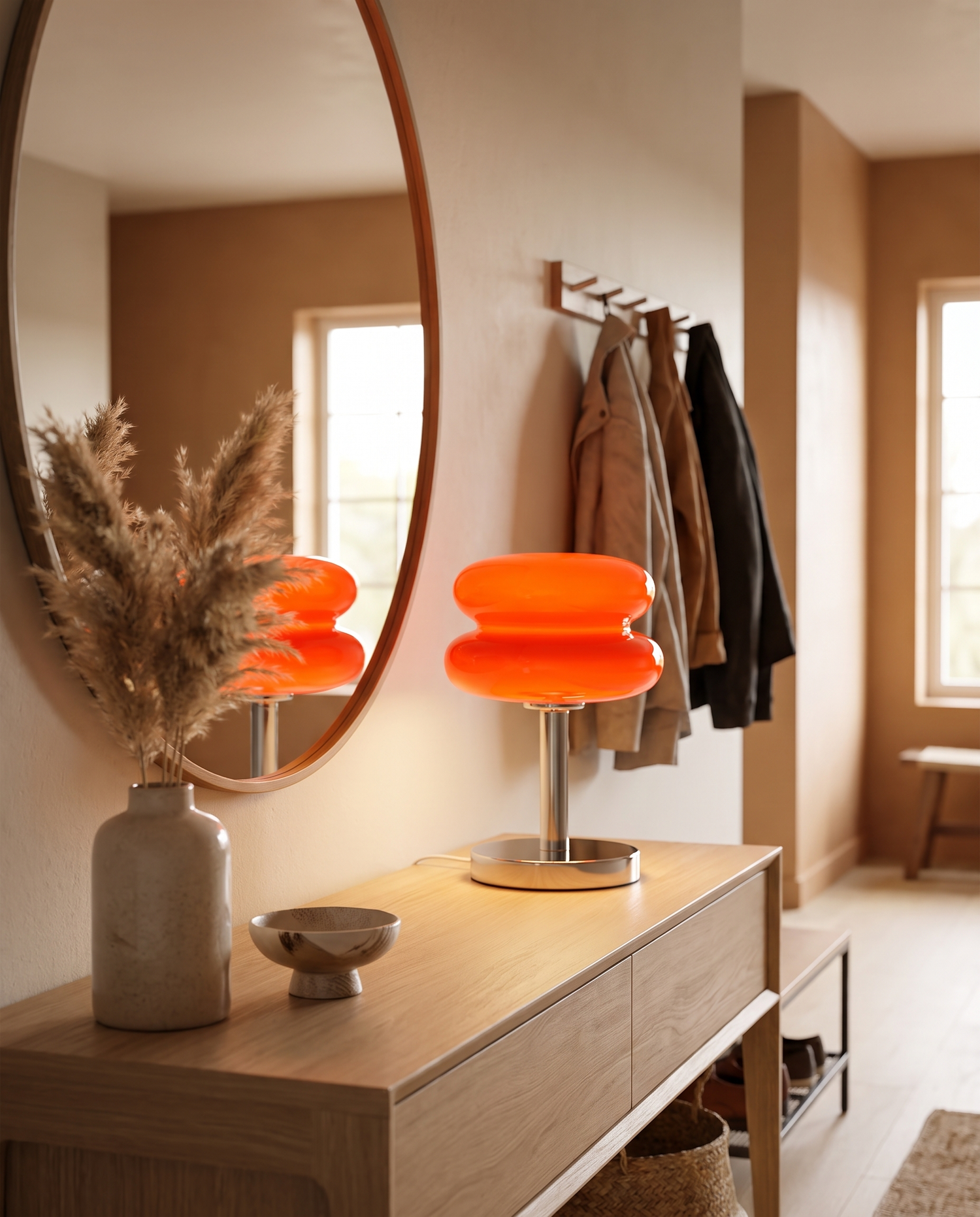 Tarta Table Lamp in Orange Red on an entryway console with a mirror