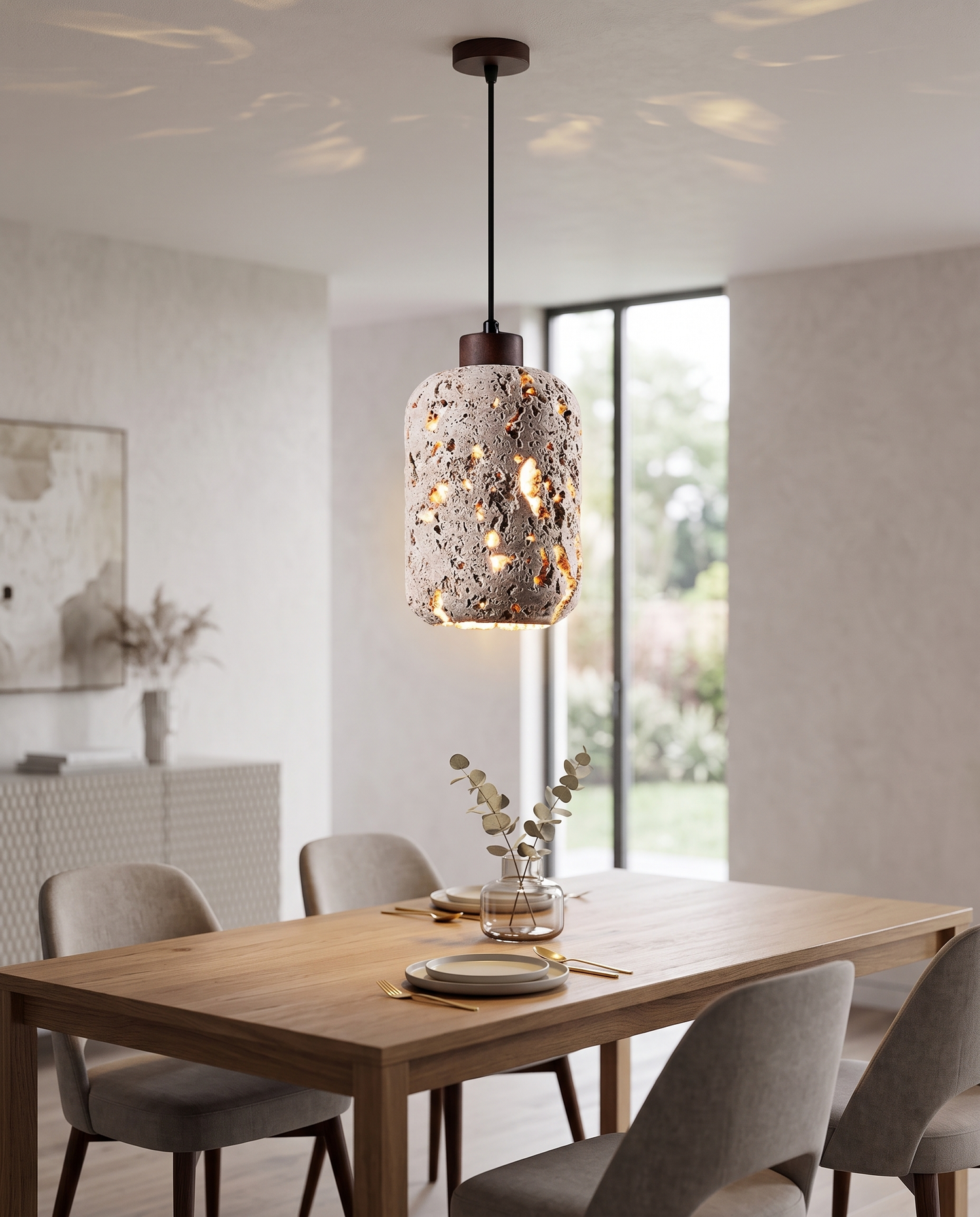 Botte Travertine Pendant Light over a dining table