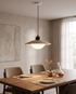 Disco Travertine Pendant Light over a dining table