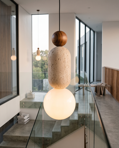 Anello Travertine Pendant Light in a stairwell
