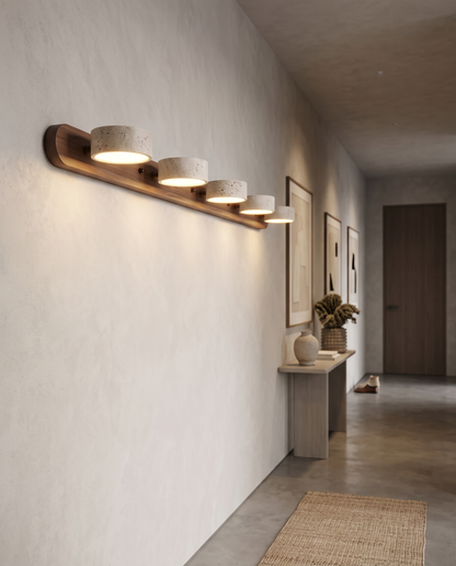 Filo Travertine Wall Sconce in a hallway