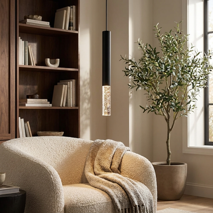 Asta Pendant (Bubble) in a living-room reading corner