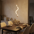 Spirale Rope Pendant (Copper) over a dining table