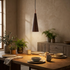 Cono Wood Pendant (Walnut) over a dining table