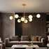 Bolla Cluster Chandelier (Gold) in a living room