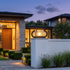 Manor oval slatted outdoor post light on a fence pillar