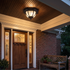 Amalie flush mount on covered entryway ceiling at dusk