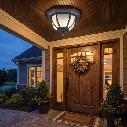 Amalie flush mount on covered porch ceiling at twilight