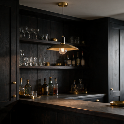 Ember Vintage Glass Brass Pendant Light above a bar counter in a cosy home bar nook