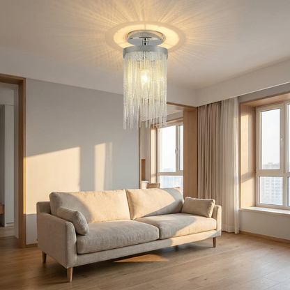 Odetta chrome metal tassel chandelier in a bright Nordic living room