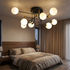 Vesta sputnik globe semi flush ceiling light in a modern bedroom