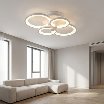 Anneau white multi ring LED ceiling light in a minimalist living room