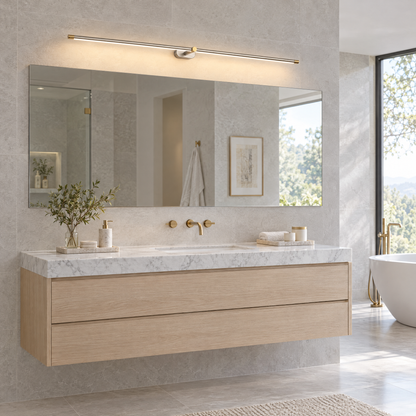 Strata Linear LED Vanity Wall Light in Brushed Nickel and Gold in a spa-like bathroom