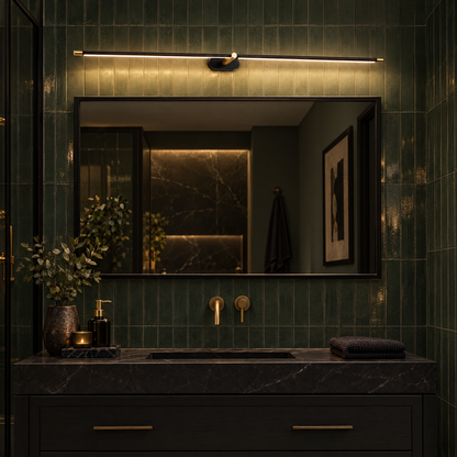 Strata Linear LED Vanity Wall Light in Black and Gold in a moody green bathroom
