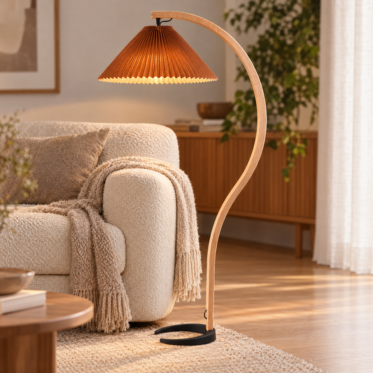 Caprani Beech Wood Linen Floor Lamp with Coffee shade, close-up over a sofa