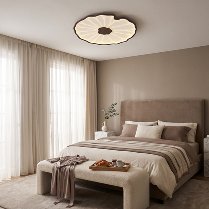 Nymphea round walnut lotus leaf ceiling light in a hotel style bedroom