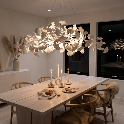 Icho White linear ginkgo leaf chandelier in a Scandinavian dining room