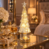 Sylvie silver glass Christmas tree lamp on a mirrored vanity