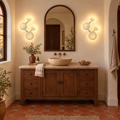 Florin ceramic petal wall sconce in white ceramic and gold, 4-petal vertical, in a California Spanish Revival bathroom