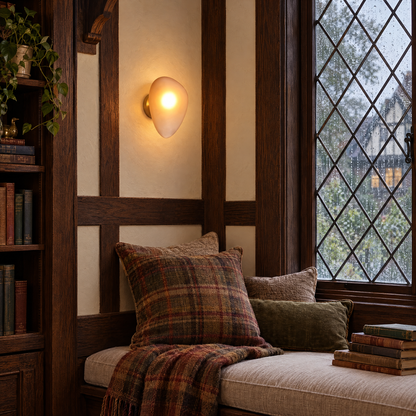 Opaline wall sconce in Amber &amp; Gold, shape ∅7.8" x H11.8" in a Tudor Revival reading nook
