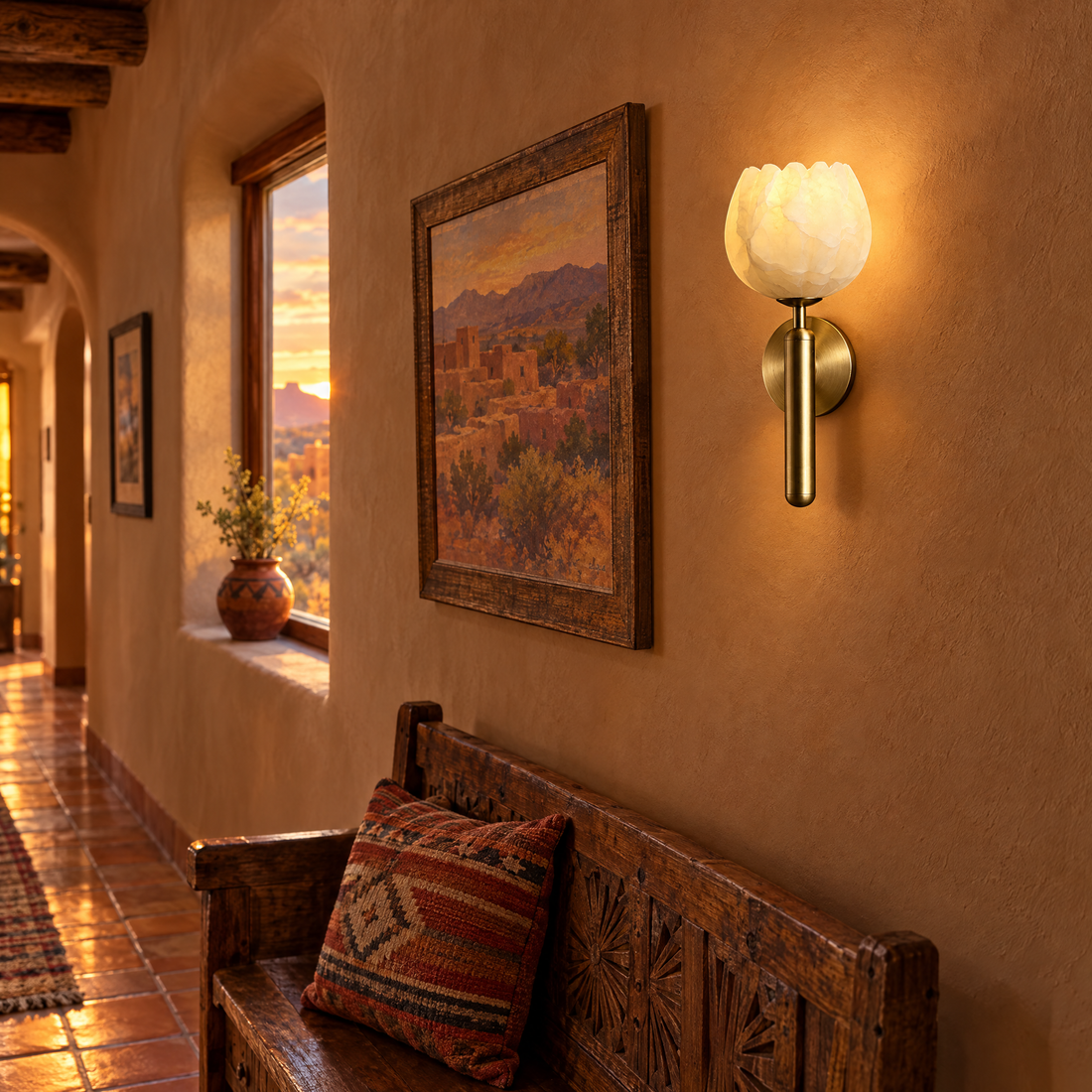 Mian alabaster flower wall sconce in brass in a Santa Fe pueblo-style hallway