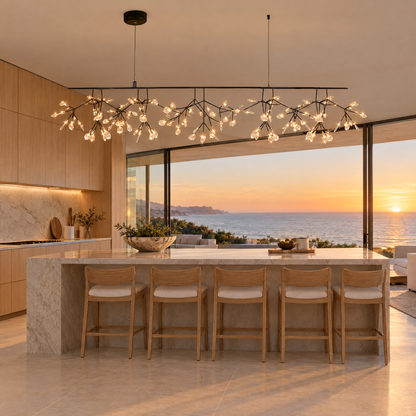 Luciole firefly LED branch chandelier in black, L59" linear, in a Malibu contemporary kitchen