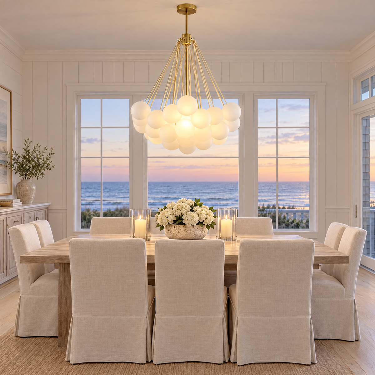 Bulle bubble chandelier in gold &amp; white frosted glass, ∅29.5" x H29.5", in a Hamptons shingle-style beach house dining room
