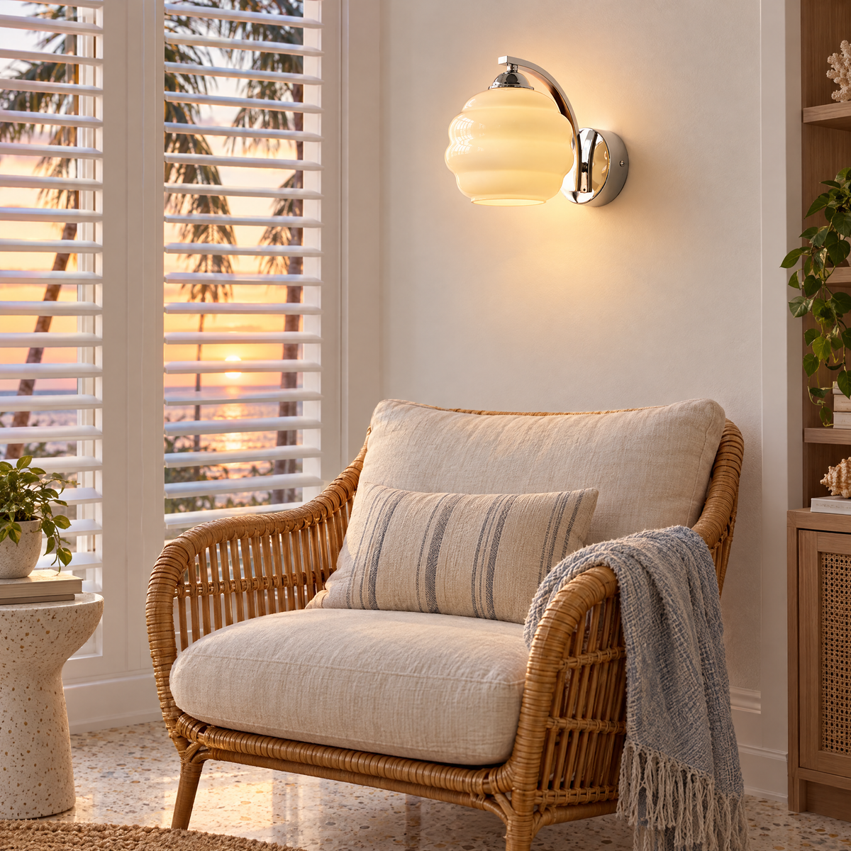 Deauville Art Deco wall sconce in Chrome &amp; Beige Glass in a Florida coastal home reading nook