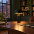 Dorsey mushroom table lamp in gloss black in a Brooklyn brownstone home office
