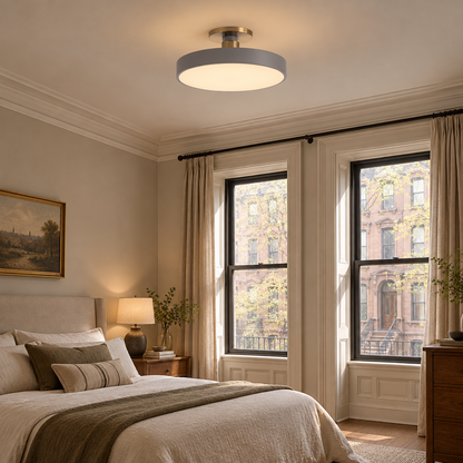 Tuva Flush Mount LED Ceiling Light, Grey, in an East Coast brownstone bedroom with tall sash windows and crown molding