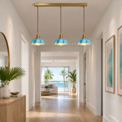 Hyacinth Pleated Glass Pendant Light, 3 Lights Brass and Blue, in a Florida modern home hallway with light wood floors and white walls